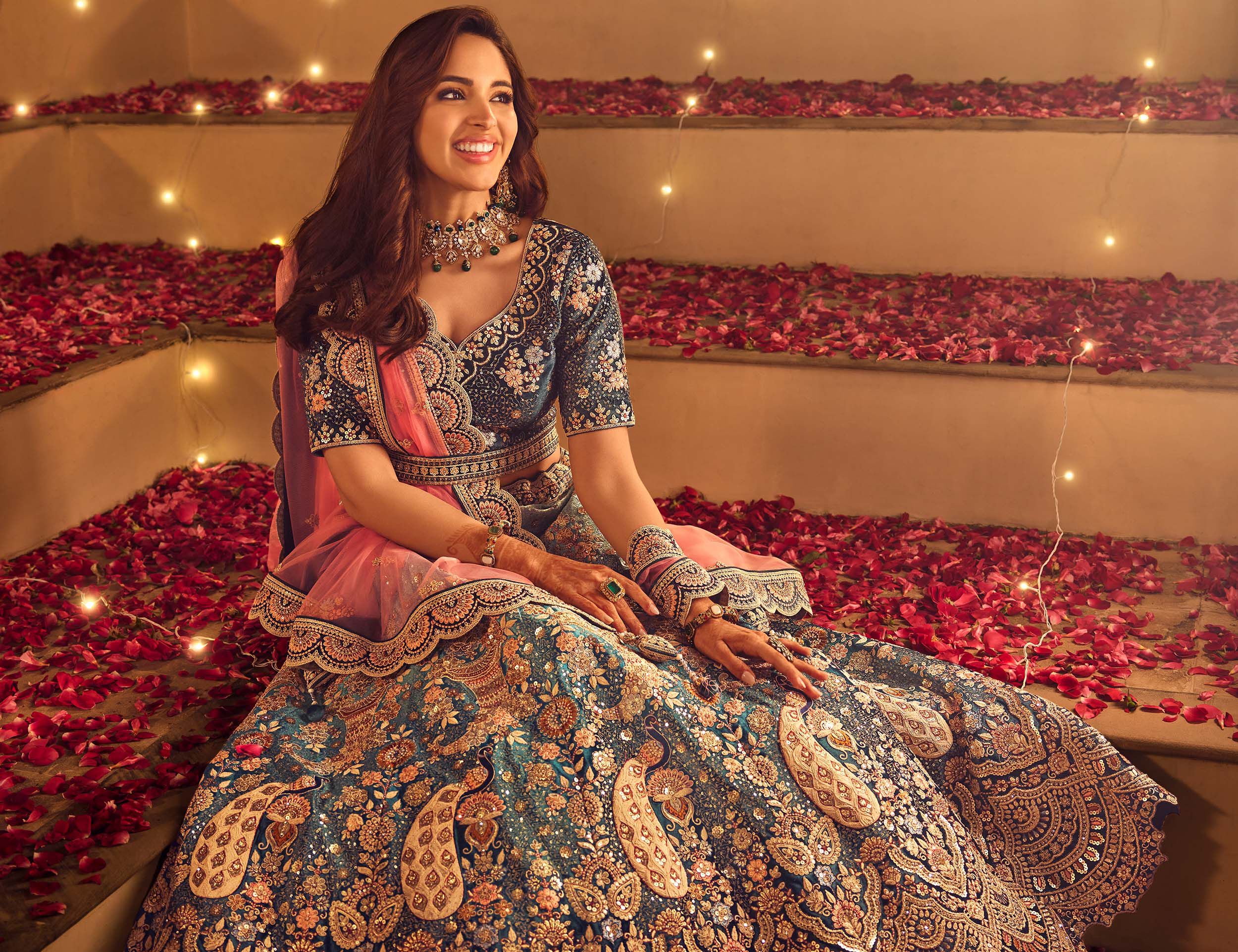 A beautiful bride in a blue designer lehenga